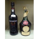 A bottle of Cockburns Special Reserve Port; and a bottle of D.O.M Benedictine