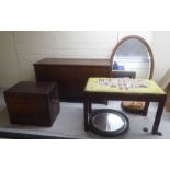 19th and 20thC small furniture: to include an oak framed music stool; and a silver chest  13"h  16"w