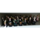 Twenty-four Royal Doulton china figures from the Charles Dickens series: to include 'Fagin'; 'Artful