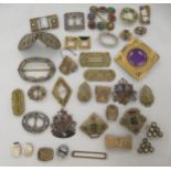 Costume jewellery: to include a two-part belt buckle; a filigree worked brooch; and assorted buckles