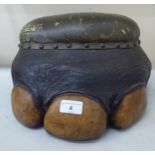 An elephant foot stool with a stud upholstered cushioned top  16"dia