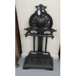 A reproduction of a Victorian black painted cast iron stickstand  35"h  17"w