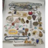 Costume jewellery: to include a white metal bangle; bracelets; and paste set necklaces