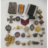 Military collectables: to include an RAF cap badge  (Please Note: this lot is subject to the