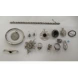 Silver coloured and white metal items of personal ornament: to include pendants and brooches,
