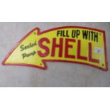 A painted cast metal sign 'Shell Oil'  5" x 15"