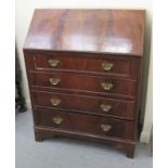 A modern mahogany finished four drawer bureau, raised on bracket feet  39"h  30"w