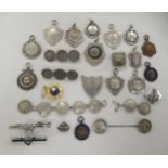 Assorted sports related medallions and brooches