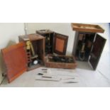 Four early/mid 20thC microscopes  cased  (completeness not guaranteed)