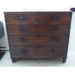 A George III mahogany five drawer dressing chest, raised on bulbous feet  38"h  43"w