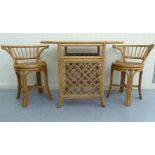 A modern bamboo framed and rattan panelled breakfast table  30"h  39"L  20"w; and a pair of matching