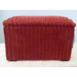 A Paul Raine Furnishings red fabric upholstered box stool with a hinged top 10"h  16"w