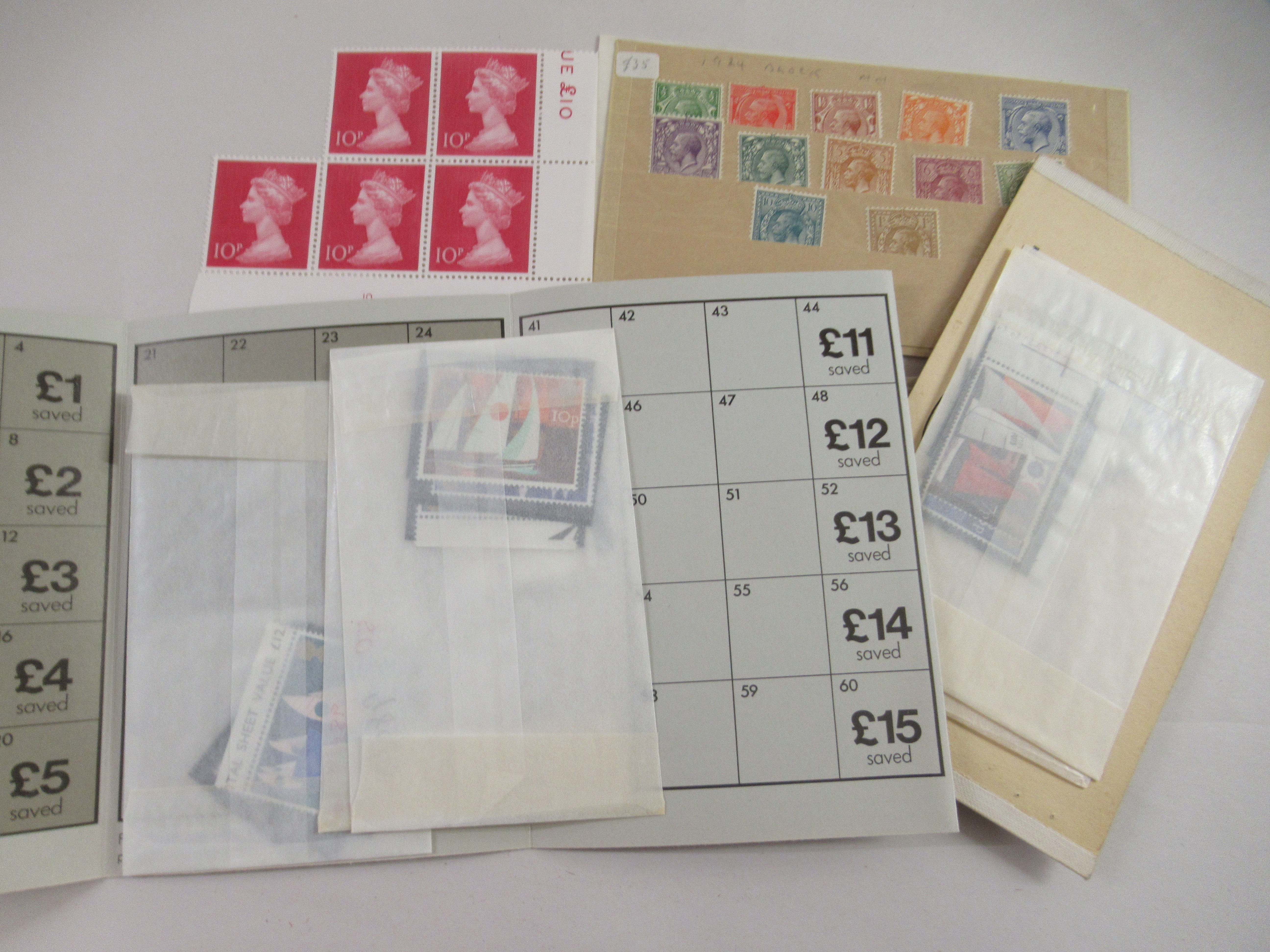 An album of postage stamps and banknotes: to include unused sheets and a £10 stamp - Image 3 of 6