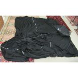 A Rolls Royce Wraith folded black fabric protective car cover, in a draw string bag