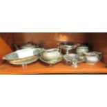 Silver plated tableware: to include a three piece tea set; and an Art Deco oval fruit dish  13"w