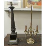 A modern 19thC style column design table lamp  29"h; and a brass triple branch example  27"h