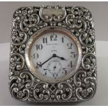 A Mappin & Webb goliath watch, in a travellers' silver mounted and hide covered case, decorated with