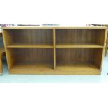 A modern North American hardwood finished two tier, open front bookcase  30"h  59"w