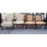 A set of four late 19thC French walnut framed salon chairs, each with a pink fabric upholstered back