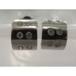 A pair of 18ct white gold diamond set earrings