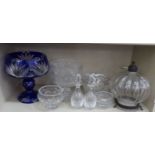 Decorative glassware: to include an overlaid, midnight blue pedestal vase  15"h; and a pair of