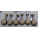 A set of six Victorian style, bronze finished wall lights with shell pattern shades