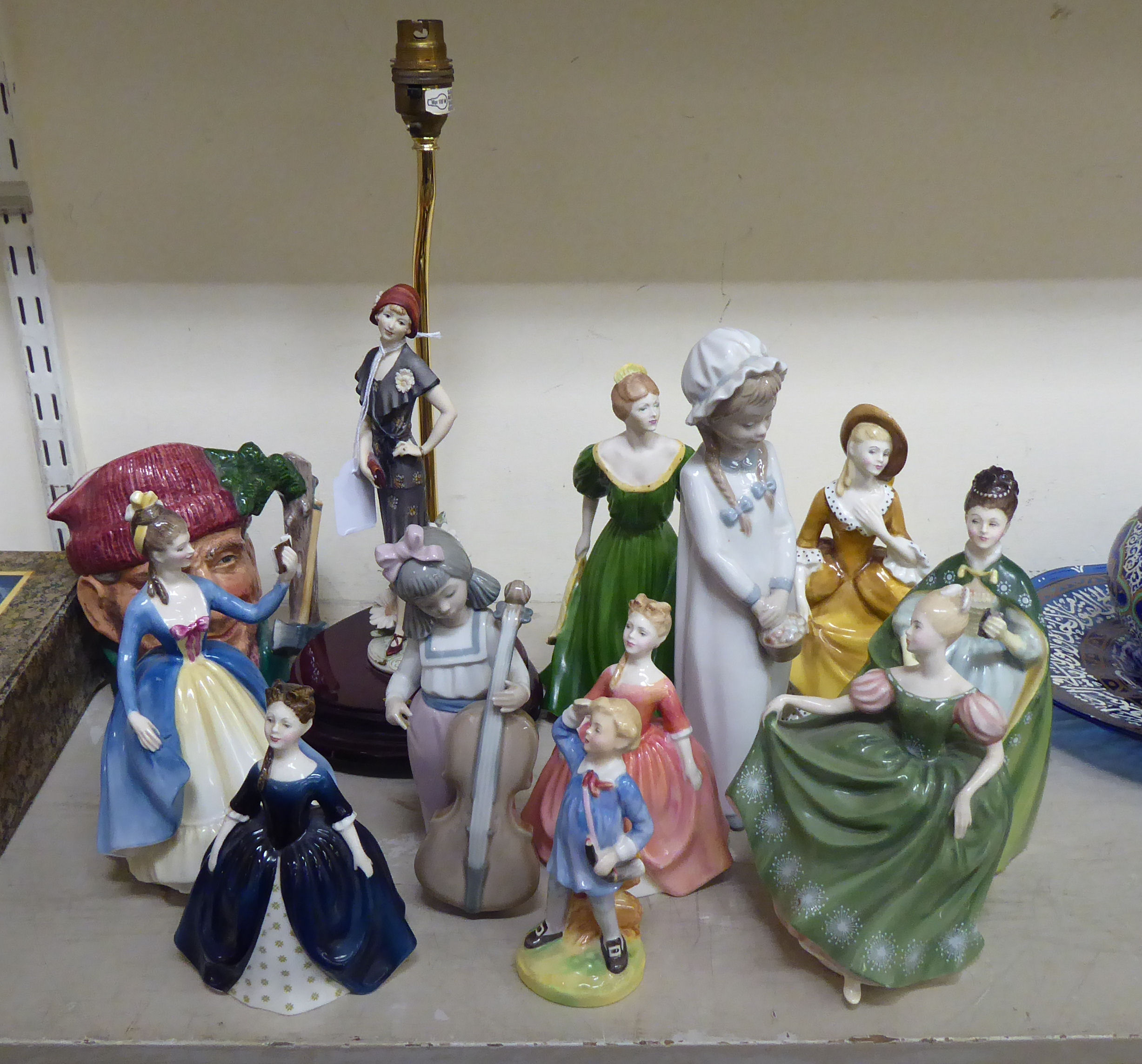 Ceramic figures: to include examples by Royal Doulton, Nao and Coalport  largest 11"h
