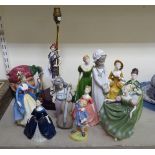 Ceramic figures: to include examples by Royal Doulton, Nao and Coalport  largest 11"h