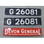 A vintage white and red enamelled steel sign 'Devon General'  4" x 20"; and two aluminium omnibus