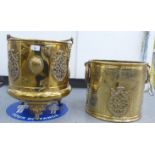 An Asian brass, drum design, coal bucket with a swing handle and applied ornament, on splayed