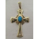 A 9ct gold turquoise set pendant cross