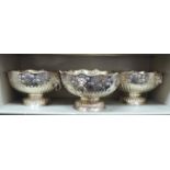 A set of three silver plated pedestal punch bowls with lion mask ring handles  12"dia