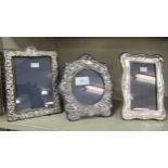 Three silver mounted photograph frames, on easel backs  mixed marks  largest 7" x 5"