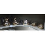 An Asprey & Co five piece silver plated tea set of bulbous form