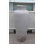 A white glazed pottery vase  36"h