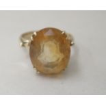 A 9ct gold cocktail ring, set with a yellow stone