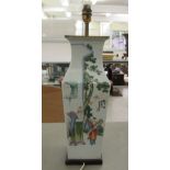 A 20thC Chinese porcelain vase lamp, decorated with figures and characters  17"h