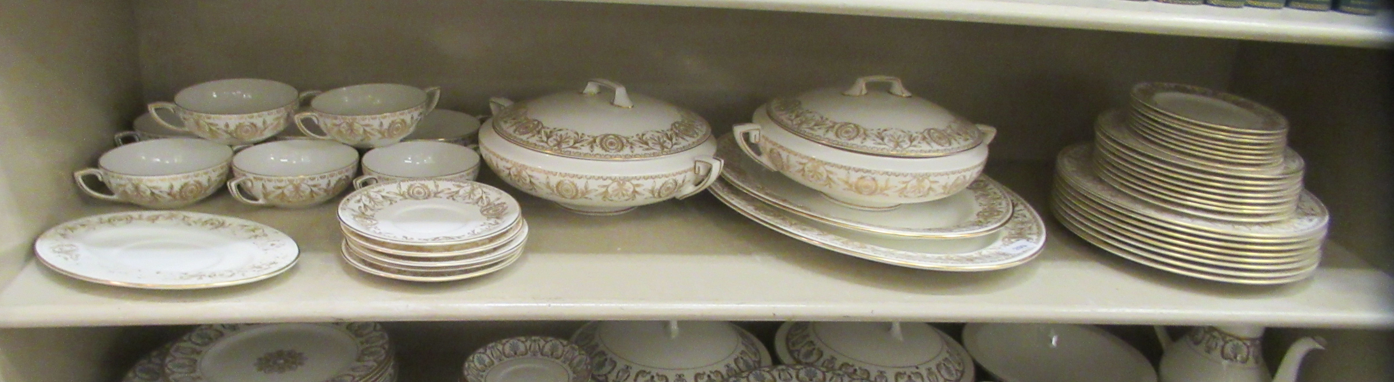 A Royal Worcester china Pompadour pattern dinner service