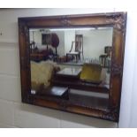 A modern mirror, the rectangular plate set in a moulded gilt frame  30" x 26"