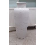 A white glazed pottery vase  36"h