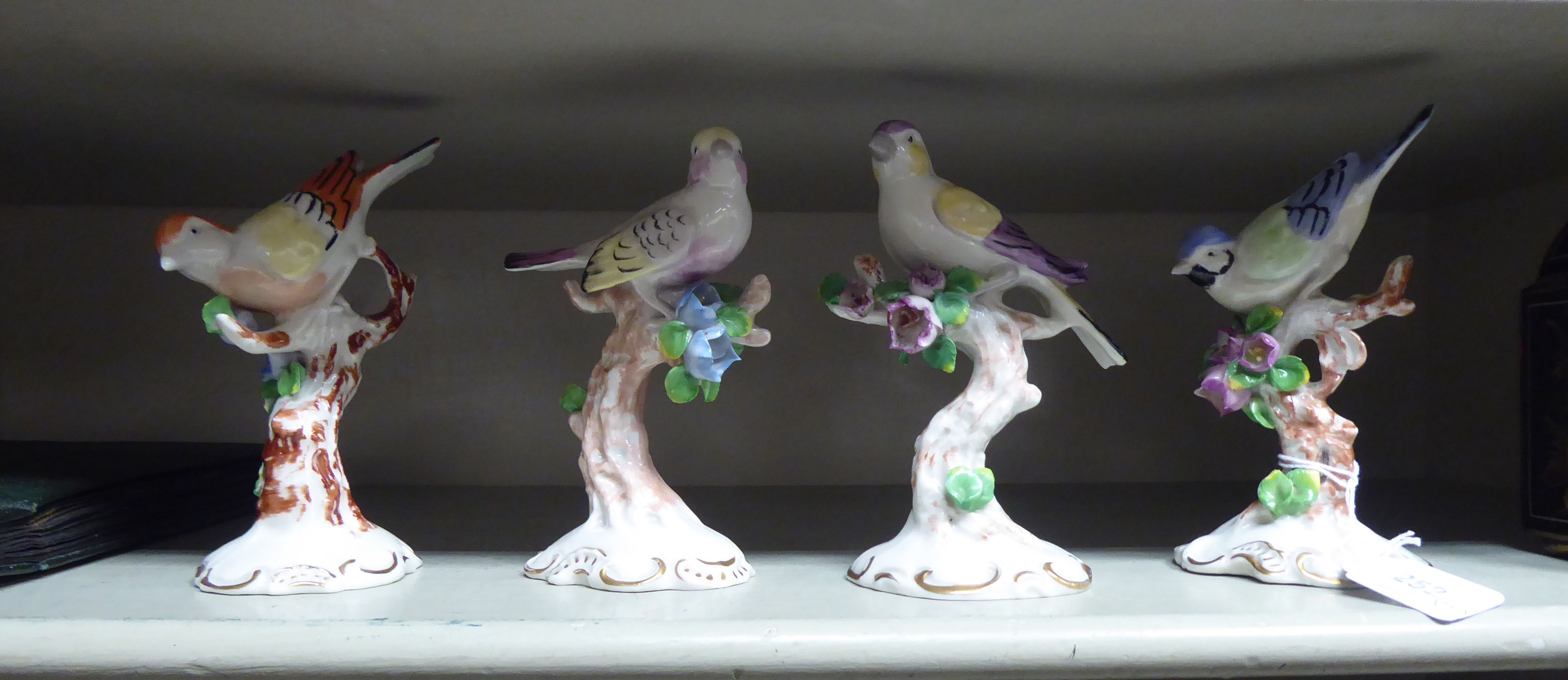 A set of four early 20thC Naples porcelain model birds  8"h