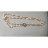 A double row cultured pearl necklace on a 9ct gold clasp