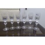 A set of six Waterford Crystal pedestal wine glasses