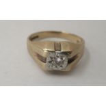 A 9ct gold signet ring, set with a central diamond