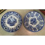 Two similar Dutch Delft chargers, decorated with flora  16.5"dia