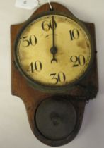 An Edwardian wall mounted kitchen timer, on a backplate, the clockwork movement with an attendant