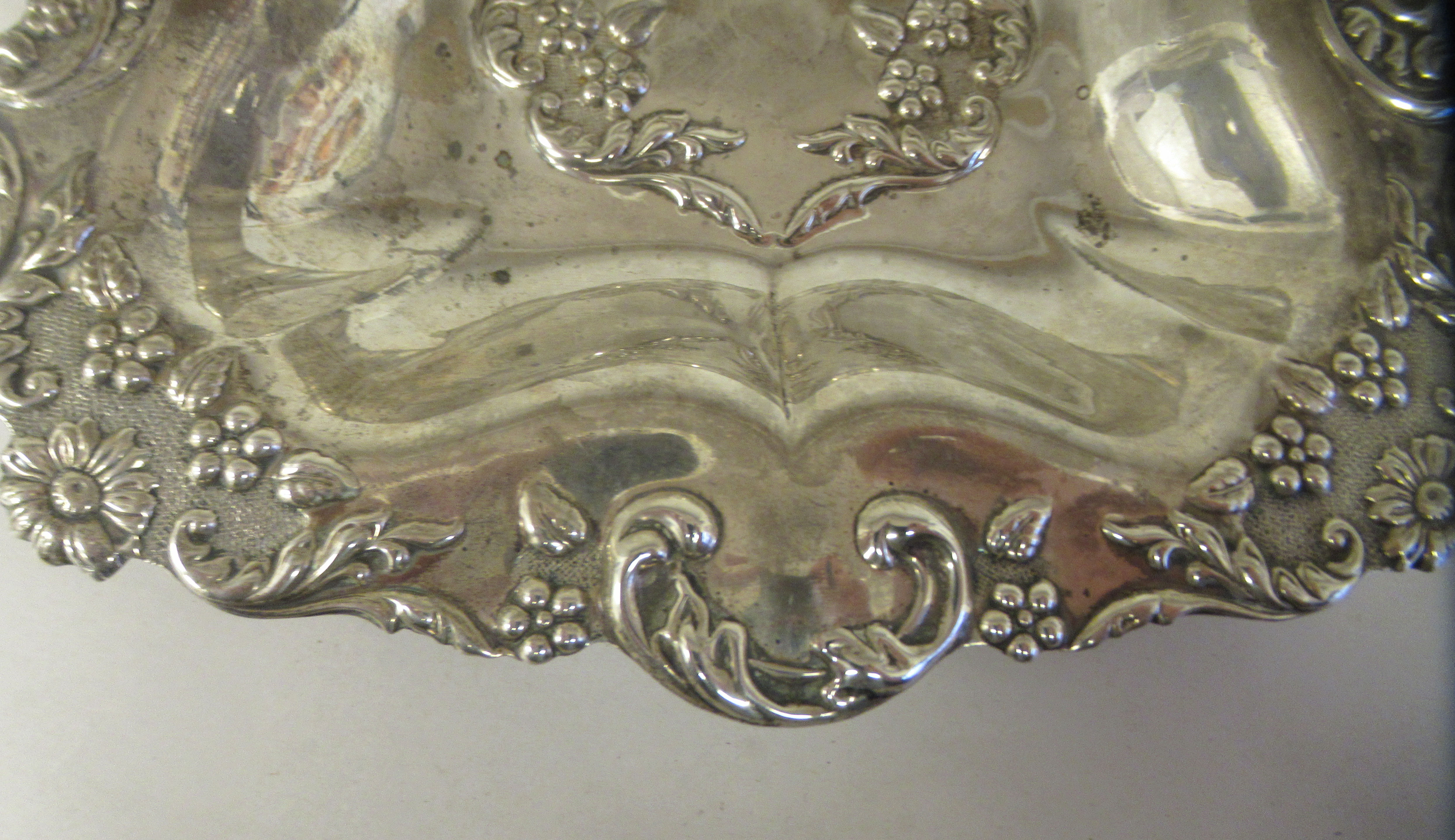 An Edwardian silver dressing table tray with a dished centre, embossed and chased foliate scrolled - Image 3 of 4