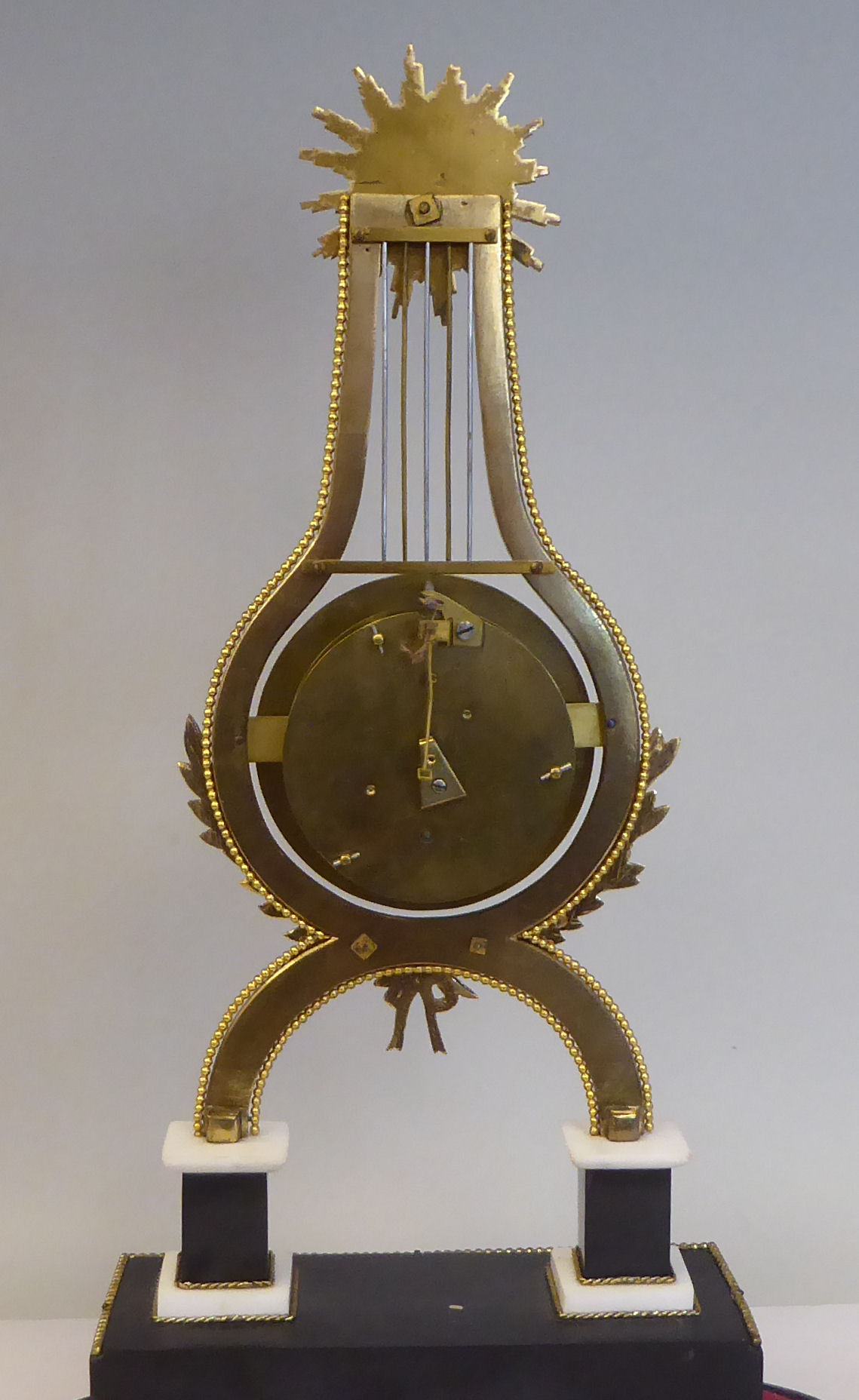 A late 19thC French gilt metal, marble and black slate mantel timepieces of lyre design with a - Image 6 of 12