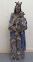A late 19th/early 20thC painted plaster figure 'The Madonna' wearing a crown and gilded robes,