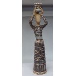 A Margit Kovacs art pottery figure, a woman holding a crown over her head  25"h